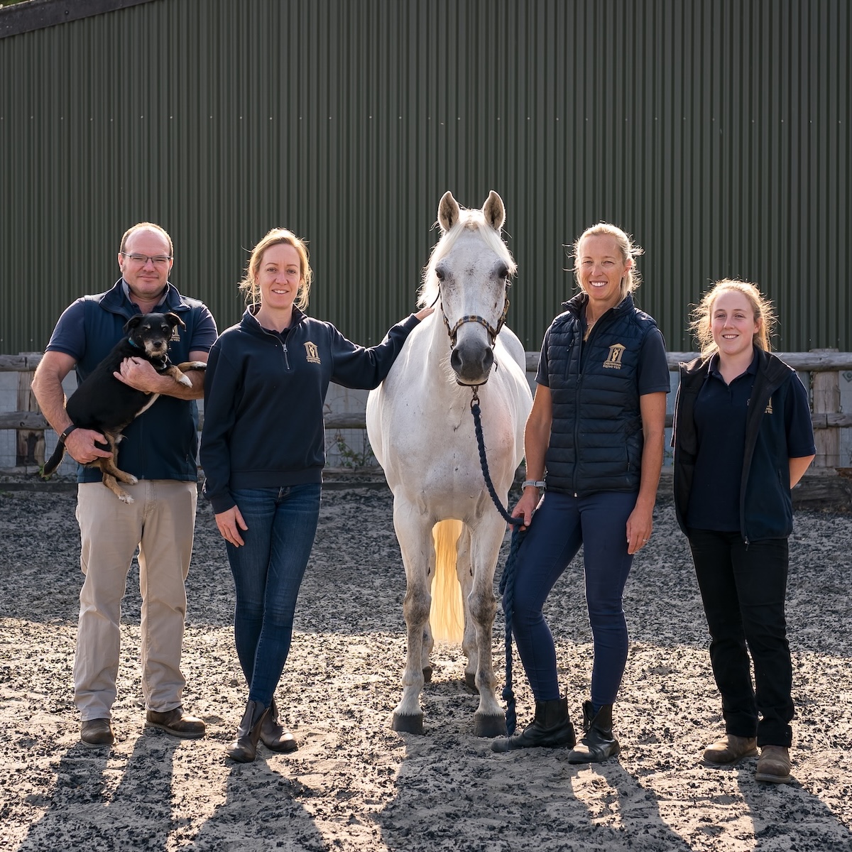 Cheltenham Equine Vets 4 Veterinary Team Members with a White Horse Square